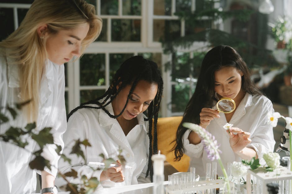 A diverse group of scientists in a laboratory conducting experiments.